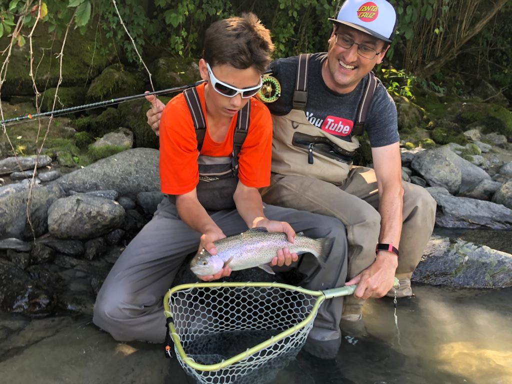 Two customers fishing for trout